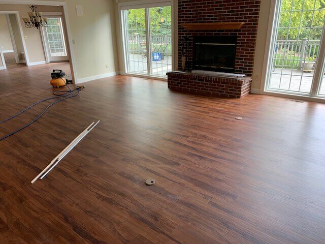 Hardwood Floor Brick Fireplace Natural Light